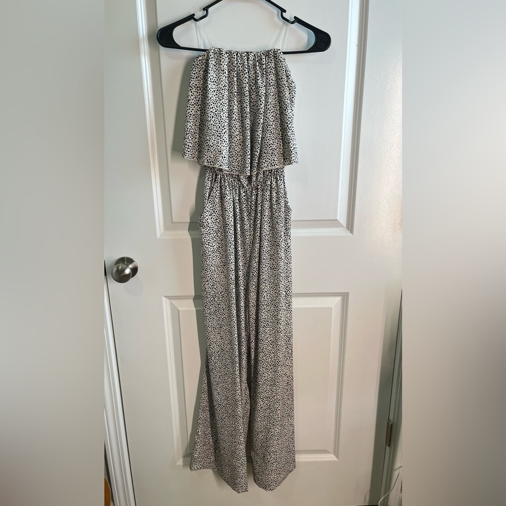 Strapless Jumpsuit with pockets. Size small off white with black specks.